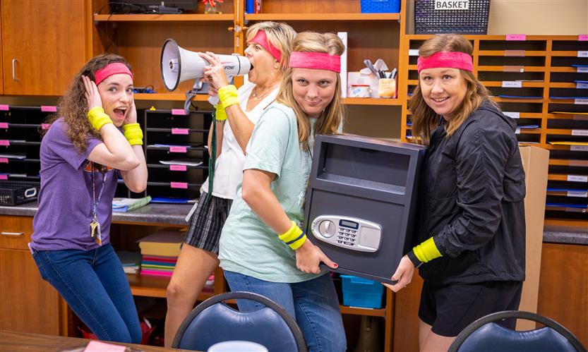 Teachers pose for a photo at Scales Elementary